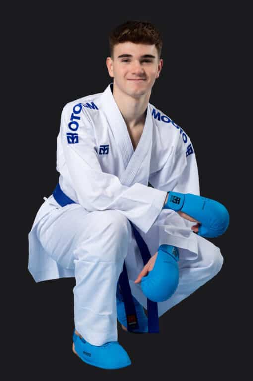 MOOTO KARATEGI KUMITE RAJIN OFICIAL WKF